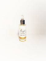 Photo of a bottle of Organic Exclusive Range Facial Oil, for skin problems, upon a white background
